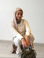 Cardigan long beige en crochet de la marque Charmosa