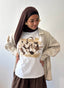 TEE shirt blanc en coton avec un imprimé vache et un motif Sac de luxe de la marque Charmosa