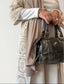 Cardigan long beige en crochet de la marque Charmosa