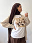 TEE shirt blanc en coton avec un imprimé vache et un motif Sac de luxe de la marque Charmosa